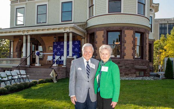 The Bauers in front of Bauer Hall Innovation Center